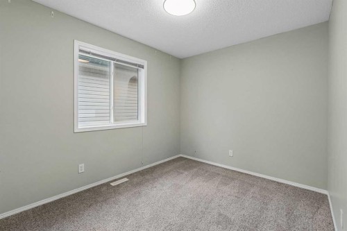 22 Somerside Crescent Sw, Calgary, AB - Indoor Photo Showing Other Room