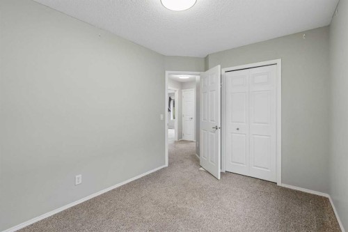 22 Somerside Crescent Sw, Calgary, AB - Indoor Photo Showing Other Room