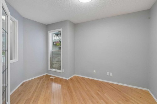 22 Somerside Crescent Sw, Calgary, AB - Indoor Photo Showing Other Room