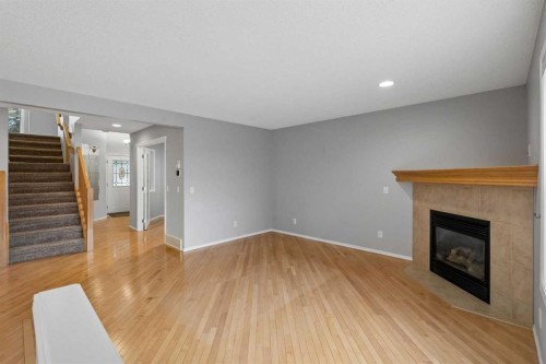 22 Somerside Crescent Sw, Calgary, AB - Indoor With Fireplace
