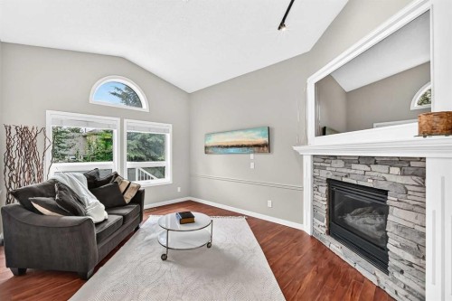 3569 Douglas Woods Heights Se, Calgary, AB - Indoor Photo Showing Living Room With Fireplace