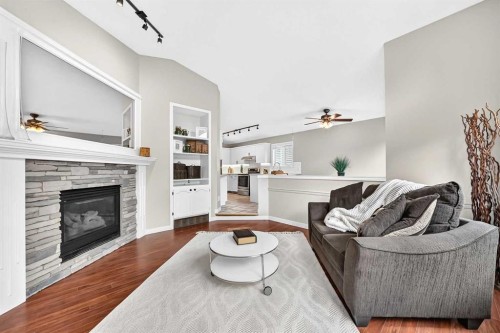 3569 Douglas Woods Heights Se, Calgary, AB - Indoor Photo Showing Living Room With Fireplace