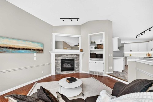 3569 Douglas Woods Heights Se, Calgary, AB - Indoor Photo Showing Living Room With Fireplace