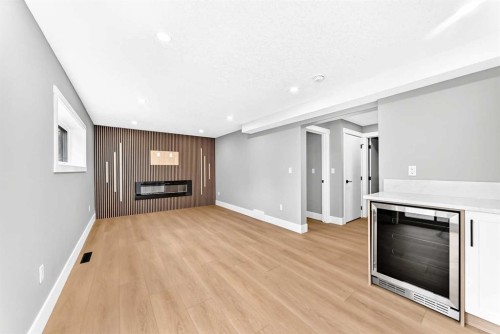 1635 32 Avenue Nw, Calgary, AB - Indoor With Fireplace