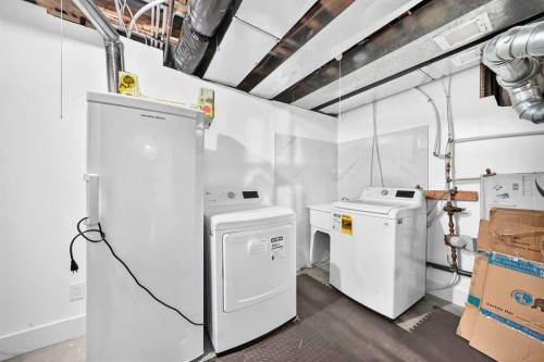 199 Hampstead Way Nw, Calgary, AB - Indoor Photo Showing Laundry Room
