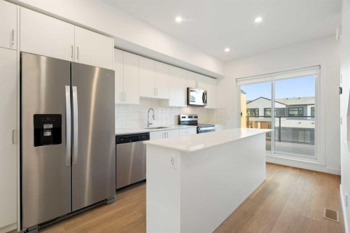 8528 21 Avenue Se, Calgary, AB - Indoor Photo Showing Kitchen With Stainless Steel Kitchen With Upgraded Kitchen