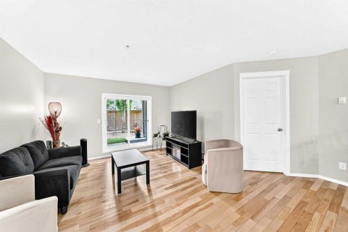 110-6315 Ranchview Drive Nw, Calgary, AB - Indoor Photo Showing Living Room