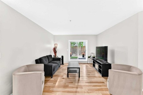 110-6315 Ranchview Drive Nw, Calgary, AB - Indoor Photo Showing Living Room