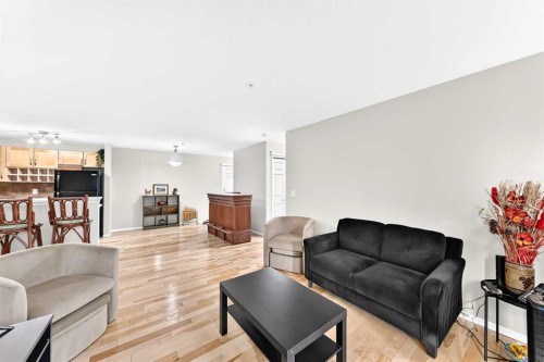 110-6315 Ranchview Drive Nw, Calgary, AB - Indoor Photo Showing Living Room