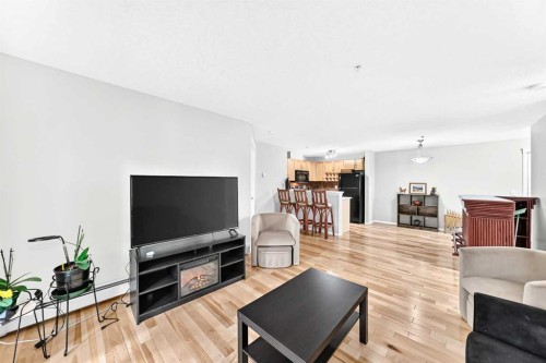 110-6315 Ranchview Drive Nw, Calgary, AB - Indoor Photo Showing Living Room