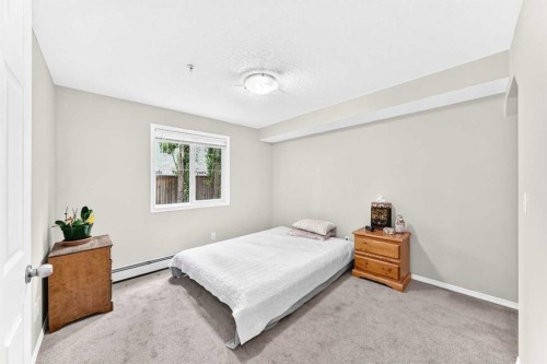110-6315 Ranchview Drive Nw, Calgary, AB - Indoor Photo Showing Bedroom