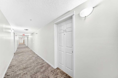 110-6315 Ranchview Drive Nw, Calgary, AB - Indoor Photo Showing Other Room