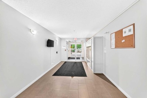 110-6315 Ranchview Drive Nw, Calgary, AB - Indoor Photo Showing Other Room