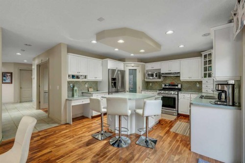 11 Tuscany Ridge Park Nw, Calgary, AB - Indoor Photo Showing Kitchen With Upgraded Kitchen