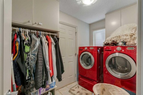 11 Tuscany Ridge Park Nw, Calgary, AB - Indoor Photo Showing Laundry Room