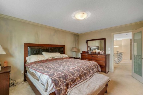11 Tuscany Ridge Park Nw, Calgary, AB - Indoor Photo Showing Bedroom