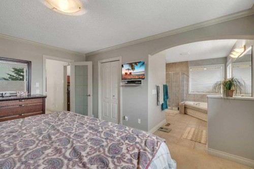 11 Tuscany Ridge Park Nw, Calgary, AB - Indoor Photo Showing Bedroom