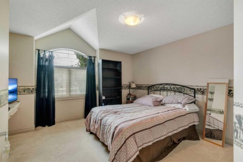 11 Tuscany Ridge Park Nw, Calgary, AB - Indoor Photo Showing Bedroom
