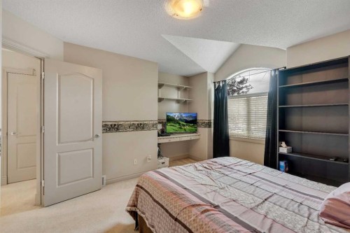 11 Tuscany Ridge Park Nw, Calgary, AB - Indoor Photo Showing Bedroom