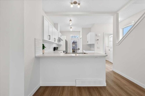 134 New Brighton Landing Se, Calgary, AB - Indoor Photo Showing Kitchen