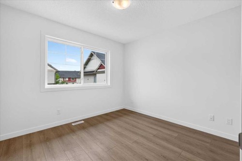 134 New Brighton Landing Se, Calgary, AB - Indoor Photo Showing Other Room