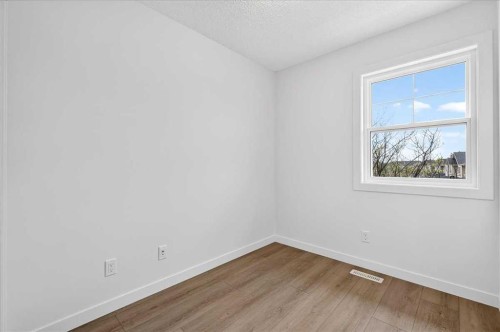 134 New Brighton Landing Se, Calgary, AB - Indoor Photo Showing Other Room