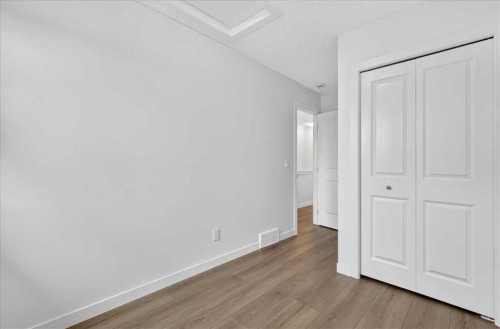 134 New Brighton Landing Se, Calgary, AB - Indoor Photo Showing Other Room