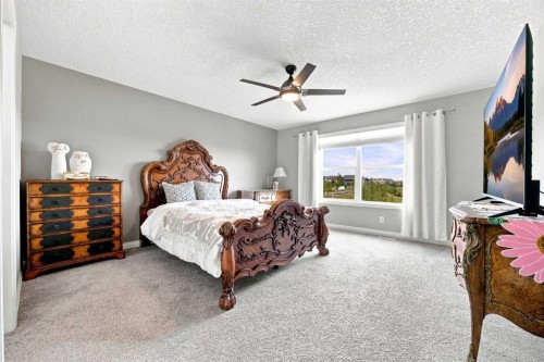 12 Masters Court Se, Calgary, AB - Indoor Photo Showing Bedroom