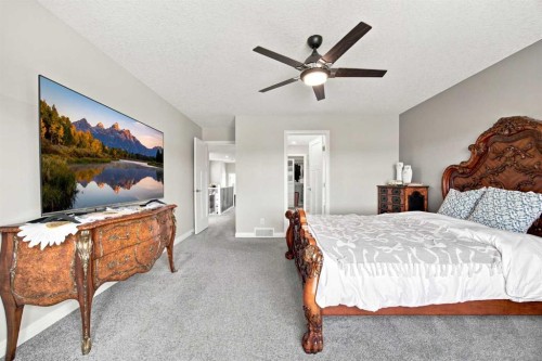12 Masters Court Se, Calgary, AB - Indoor Photo Showing Bedroom