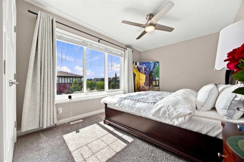 12 Masters Court Se, Calgary, AB - Indoor Photo Showing Bedroom