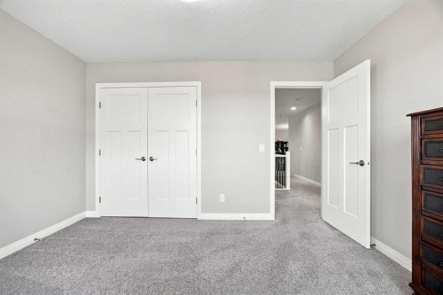 12 Masters Court Se, Calgary, AB - Indoor Photo Showing Other Room