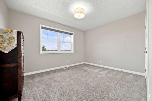 12 Masters Court Se, Calgary, AB - Indoor Photo Showing Other Room