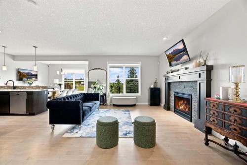 12 Masters Court Se, Calgary, AB - Indoor With Fireplace