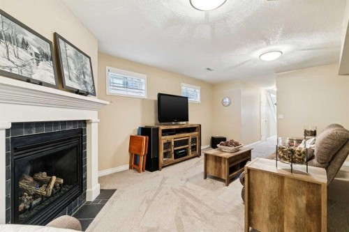 2213 27 Avenue Sw, Calgary, AB - Indoor Photo Showing Living Room With Fireplace