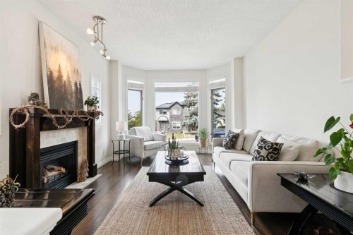 2213 27 Avenue Sw, Calgary, AB - Indoor Photo Showing Living Room With Fireplace