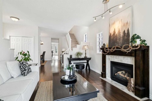 2213 27 Avenue Sw, Calgary, AB - Indoor Photo Showing Living Room With Fireplace