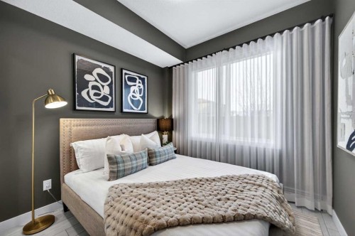 2304-265 Wolf Willow Boulevard Se, Calgary, AB - Indoor Photo Showing Bedroom