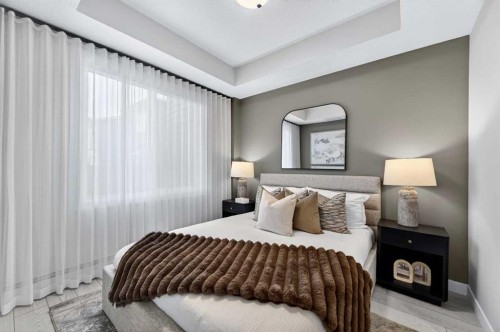 2304-265 Wolf Willow Boulevard Se, Calgary, AB - Indoor Photo Showing Bedroom