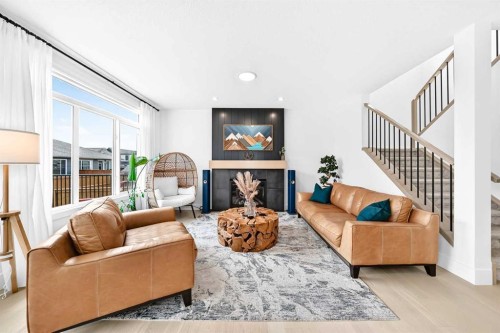 24 Emerson Crescent, Okotoks, AB - Indoor Photo Showing Living Room