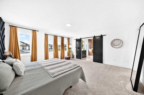 24 Emerson Crescent, Okotoks, AB - Indoor Photo Showing Bedroom
