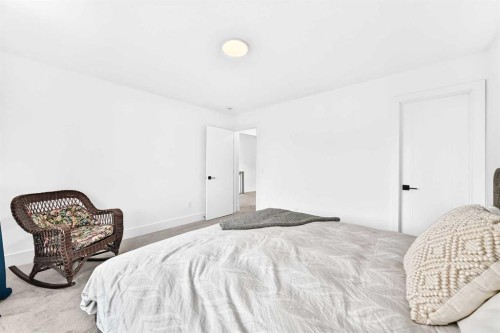 24 Emerson Crescent, Okotoks, AB - Indoor Photo Showing Bedroom