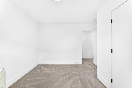 24 Emerson Crescent, Okotoks, AB - Indoor Photo Showing Other Room