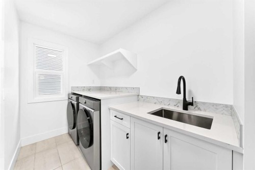 24 Emerson Crescent, Okotoks, AB - Indoor Photo Showing Laundry Room