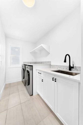 24 Emerson Crescent, Okotoks, AB - Indoor Photo Showing Laundry Room