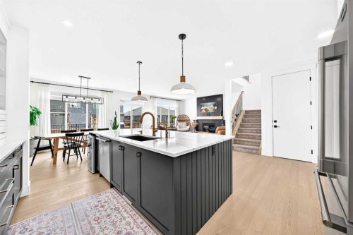 24 Emerson Crescent, Okotoks, AB - Indoor Photo Showing Kitchen With Upgraded Kitchen