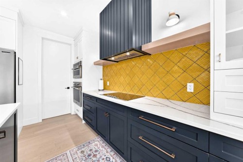 24 Emerson Crescent, Okotoks, AB - Indoor Photo Showing Kitchen