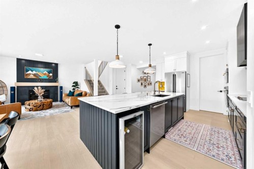 24 Emerson Crescent, Okotoks, AB - Indoor Photo Showing Kitchen With Stainless Steel Kitchen With Upgraded Kitchen