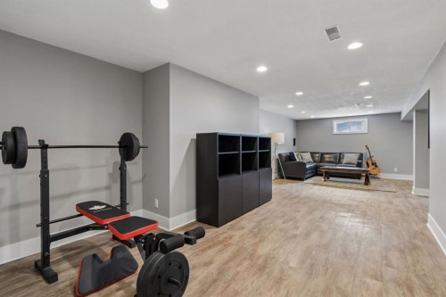 91 Winslow Crescent Sw, Calgary, AB - Indoor Photo Showing Gym Room
