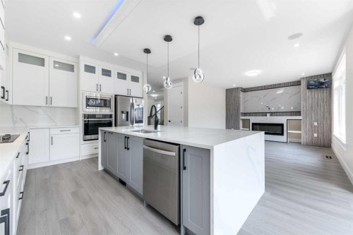 1004 Waterford Drive, Chestermere, AB - Indoor Photo Showing Kitchen With Upgraded Kitchen