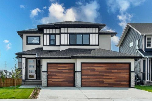 1004 Waterford Drive, Chestermere, AB - Outdoor With Facade